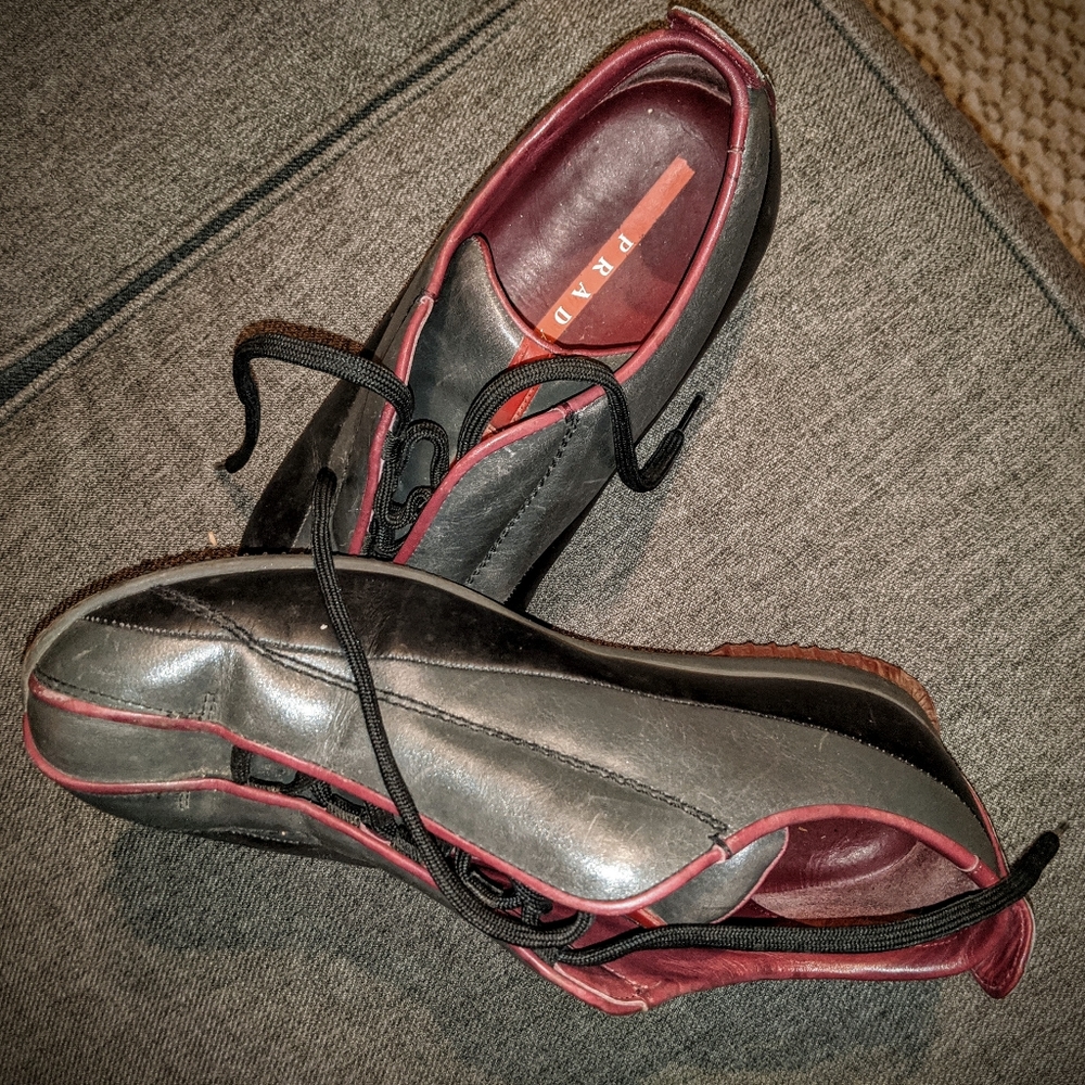 Prada leather lace up shoes.